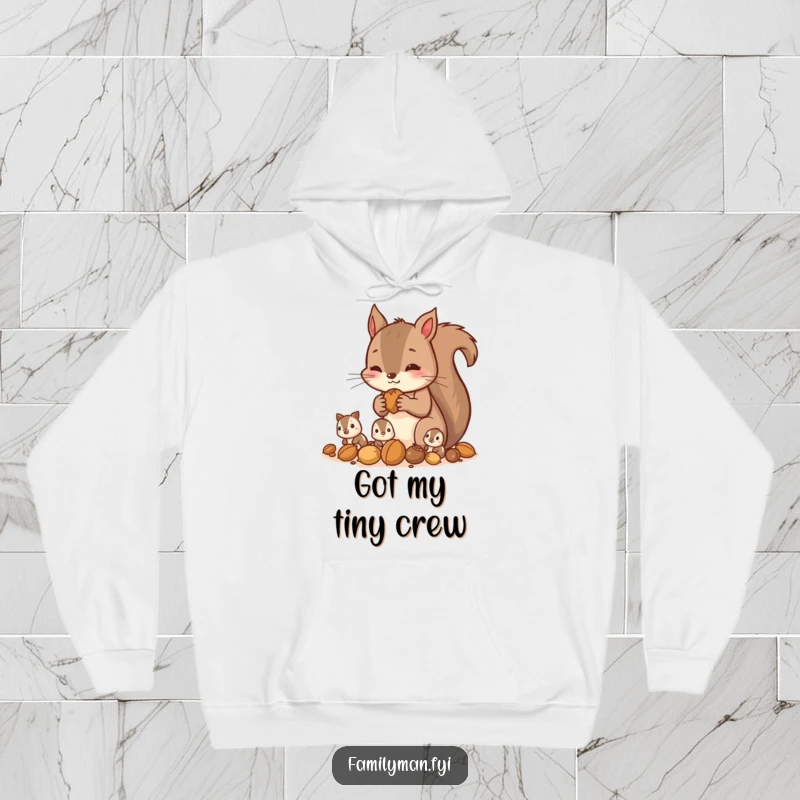 Funny squirrel hoodie showing a parent squirrel gathering nuts with its children, a cozy and humorous family scene.