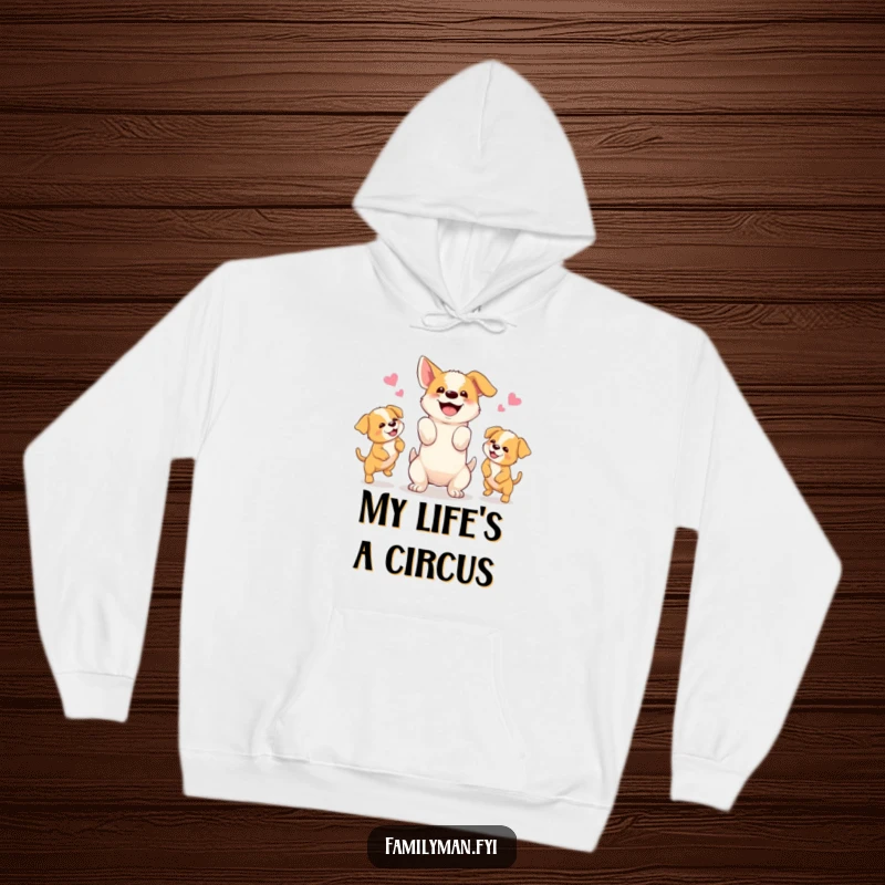 Funny hoodie depicting a happy dog juggling three energetic puppies, offering a warm embrace of canine joy.