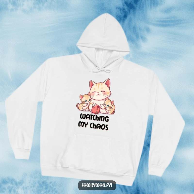 Funny proud dad cat watching his kittens bat at a toy mouse, featured on a warm hoodie. A cozy and humorous design for cat lovers.