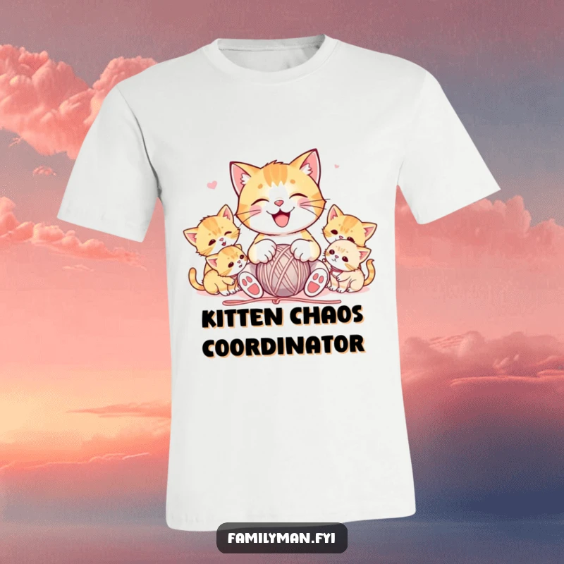 Funny t-shirt showing a joyful cat playing with a ball of yarn, with several adorable kittens gathered around, capturing a moment of playful chaos.