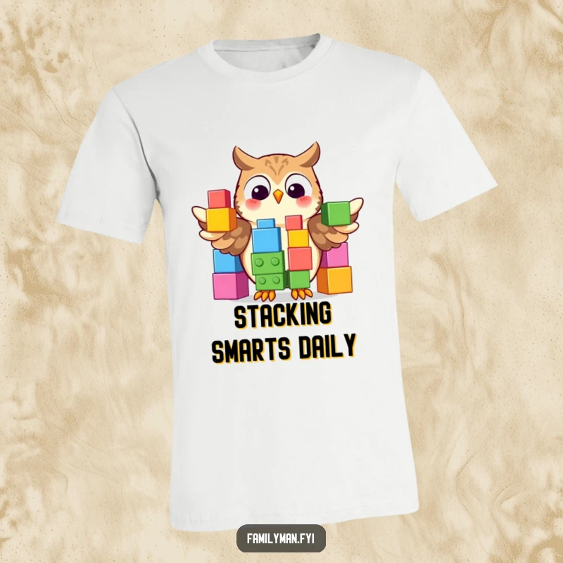 Funny T-Shirt depicting a proud owl showcasing a vibrant stack of oversized building blocks, representing intelligence and creativity.